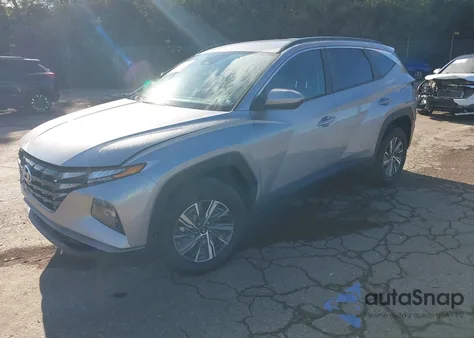 2024 Hyundai Tucson Hybrid Blue z USA, uszkodzony, nr VIN KM8JBCD10RU207301